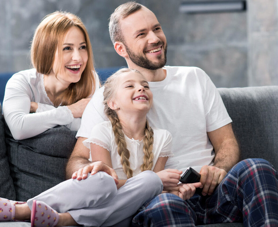 Happy family enjoying comfort in their Fresno home with reliable HVAC from Sequoia Air Co.