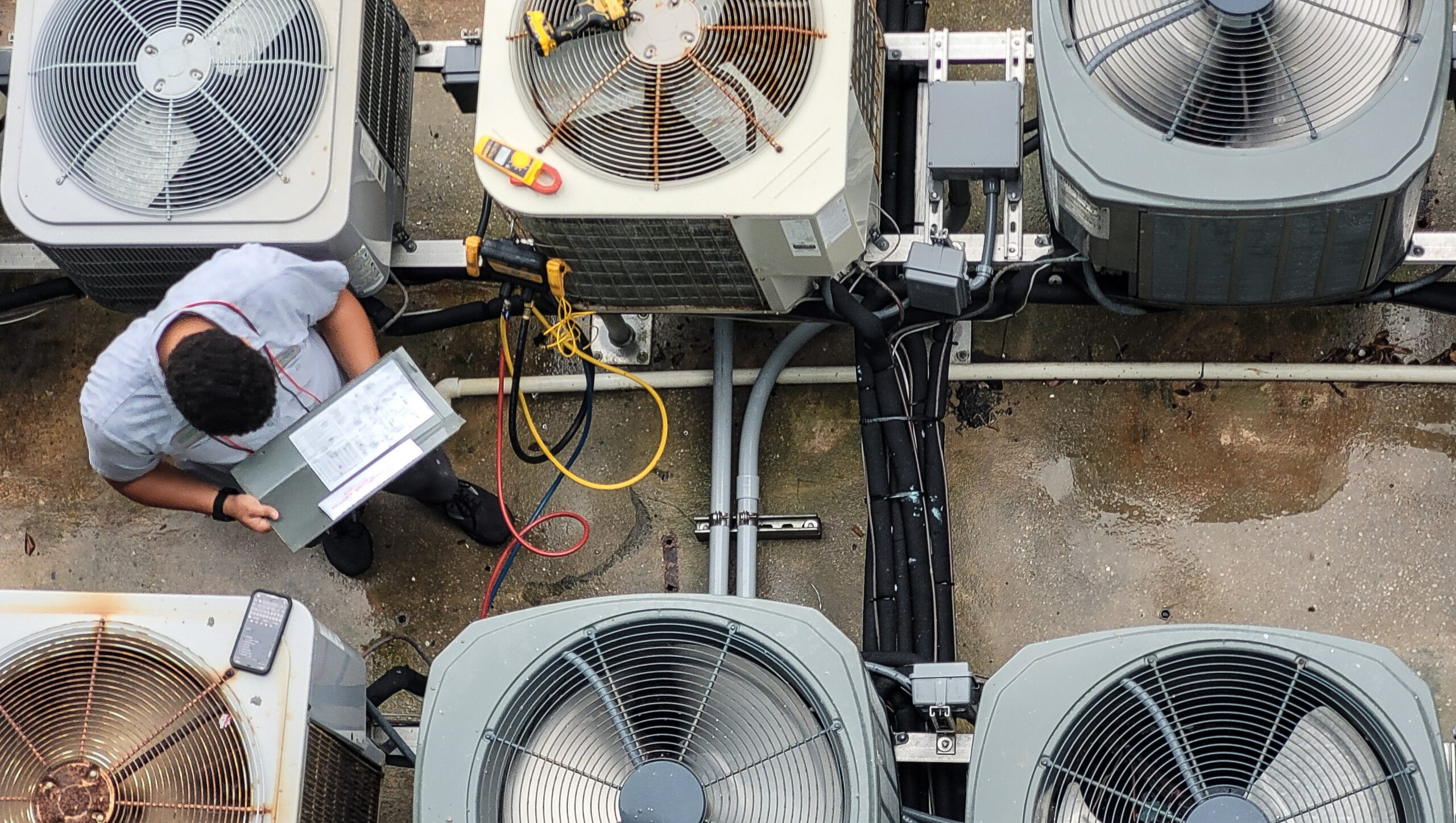 Fresno HVAC technician reviewing a service estimate for a furnace replacement